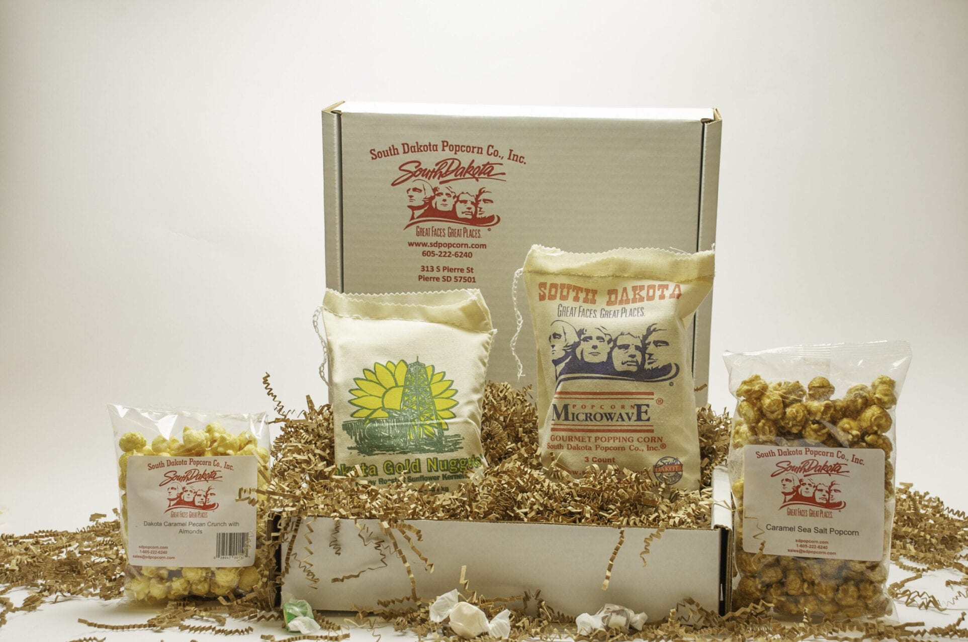 https://sdpopcorn.com/wp-content/uploads/2020/12/South-Dakota-Popcorn-Trapper-Gift-Box-1-scaled.jpg